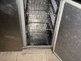 an image of a stainless steel refrigerator with a door open