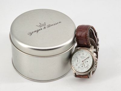 YOUNG & BRESSON. Montre d'homme en acier.