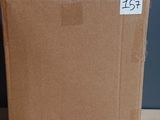 a cardboard box sitting on a table with a price tag on it