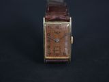 an image of an old watch on a black background