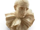 sculpture of a bust of a man with a hat on his head