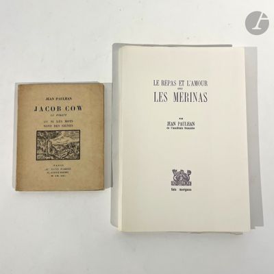 two books sitting on top of a white table next to each other