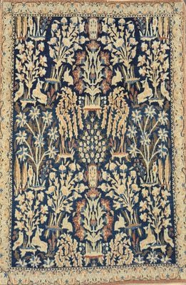 a blue and yellow rug with a floral design on it