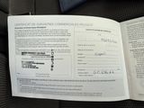 a document with a picture of a person holding a cell phone