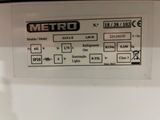 a picture of a close up of a sign on a washing machine