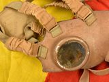 a gas mask with a skull in the middle of it