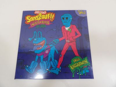 la couverture d'une bande dessinée représentant un homme en costume rouge et un chien bleu