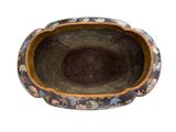a small bowl with a floral design on it