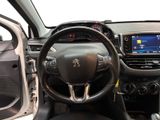 the interior of a car with a steering wheel, dashboard, and dash board