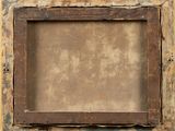 an old wooden picture frame with a worn paint on it