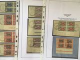 two pages of different stamps on a table with a picture of them