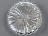 an image of a clear glass plate with a circular design