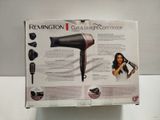 packaging of a hair dryer sitting on top of a white table