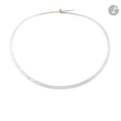 silver plated necklace with a thin, round design on a white background