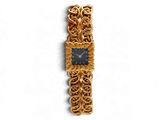 une photo d'une montre-bracelet en or avec un cadran noir