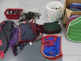 many bags and other items that are on the floor