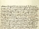 un gros plan d'un morceau de papier sur lequel on a écrit