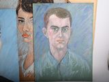 three paintings of a man and a woman on the wall