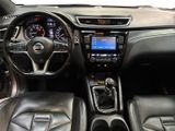 the interior of a car with a steering wheel, dashboard, and dashboard controls