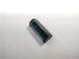 a close up of a piece of glass on a white surface