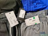 three pairs of pants that are next to each other