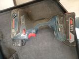 a cordless drill that is sitting on the floor