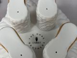 four salt and pepper shakers in the shape of flip flop flop flop flop flop flop flop flop