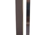 a tall metal pole with a mirror on top of it