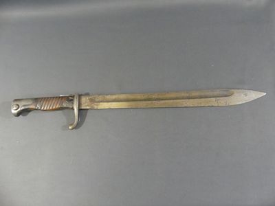 a small knife that is laying on a table