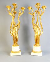Paire de candélabre à 3 lumières, en bronze doré sur un socl…