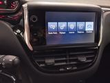 a picture of a car dashboard with a display on it