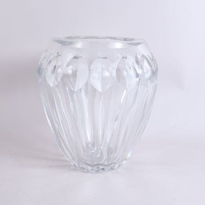 a clear glass vase that is sitting on a table
