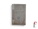 an old book that is sitting on a table