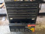 a black tool box with a lot of tools in it