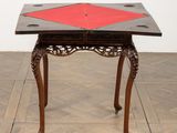 a small table with a red square on top of it