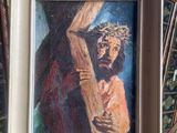 an oil painting of jesus carrying the cross on an easel
