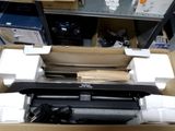 a box that has a printer in it on a table