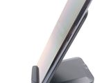 a cell phone that is sitting on a stand
