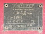 a plaque on the side of a red truck