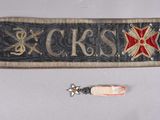 a military sash with a red star and cross on it