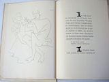 an open book with a drawing of a man and a woman on it