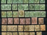 a close up of a picture of a bunch of stamps on a table