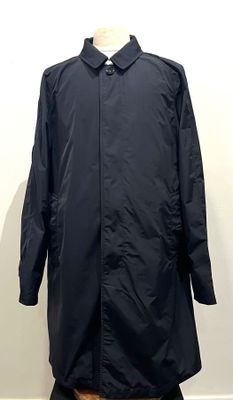 the coat is black and has a white collar