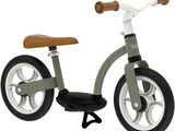 a toy bike with a wooden seat and a handlebar