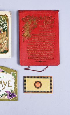 three books are sitting next to each other on a table