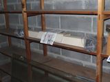 a shelf that has a bunch of items on it