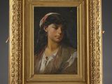 a painting of a woman with a red headband on an easel
