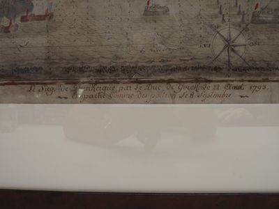 a picture of a bathtub in a bathroom that has a picture of a man on it