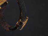 an image of a close up of a wrist with a watch on it
