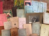 a lot of old books on the table together